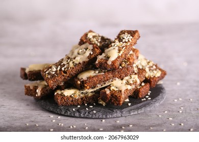 black bread croutons with cheese and garlic