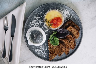 Black Bread Croutons With Hummus Top View