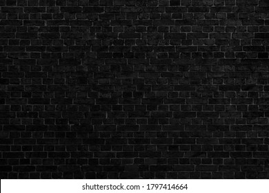Black brick building wall. Interior of a modern loft. Background for design and interview recording.