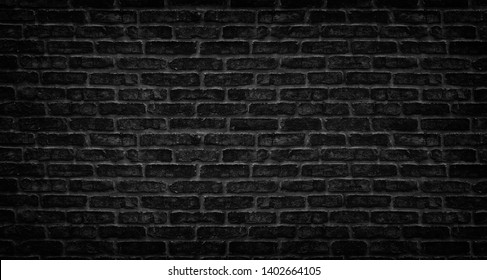 Black brick wall texture. Aged stone block masonry. Dark gloomy background