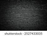 black brick wall texture as background or wallpaper for inserting text