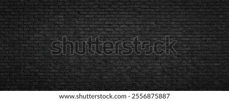 black brick wall texture as background or wallpaper for inserting text