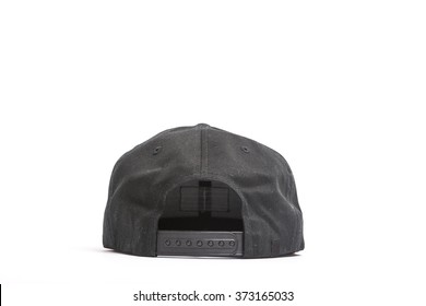A Black And Brown Fabric Hat(cap) With Solid Back Side View For Hip Hop On The Bottom Isolated White.