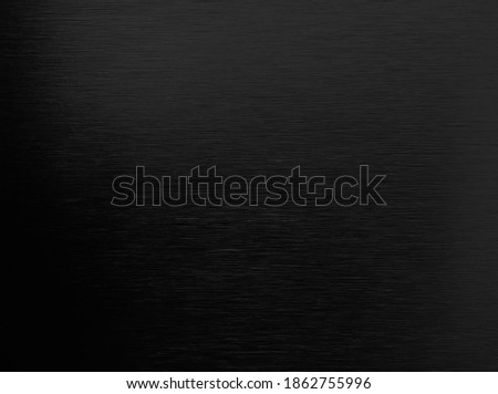 black brushed metallic aluminum texture background. abstract background. interior metal laminated material background.