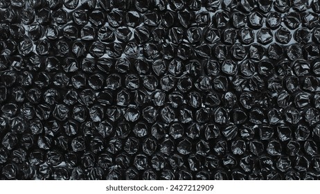 black bubble wrap plastic texture close up. black bubble wrap plastic background - Powered by Shutterstock