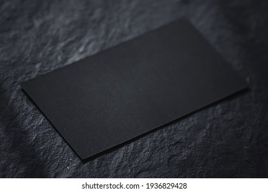 Black business card on dark stone flatlay background and sunlight shadows, luxury branding flat lay and brand identity design for mockups - Powered by Shutterstock