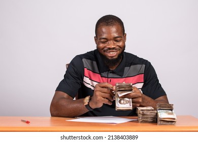 Black Business Man Counting Money