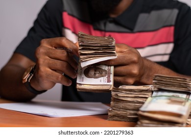 Black Business Man Counting Money