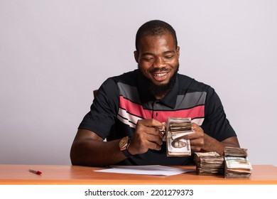 Black Business Man Counting Money