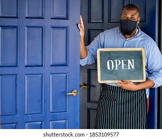 Black Business Owner In Mask During New Normal Post Pandemic