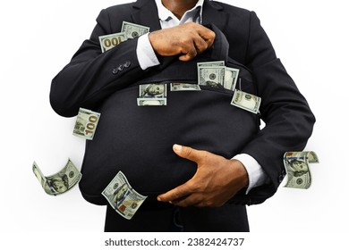 Black Businessman holding black bag full of US dollar notes isolated on white background, money falling from bag - Powered by Shutterstock - Get 15% off with code: PIKWIZARD15