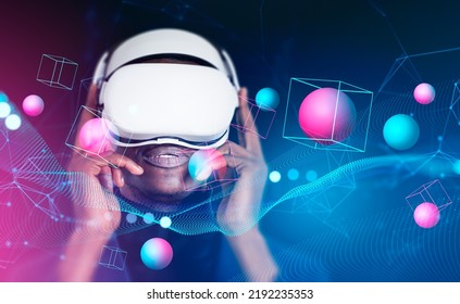 Black businessman portrait in vr glasses, working in virtual world with data spheres and blocks, colorful lines and digital connection. Concept of metaverse