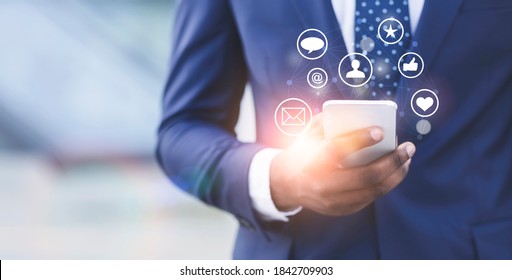 Black businessman promoting his company online, working on brand awareness in social media, collage with copy space. SMM specialist managing digital marketing campaign on smartphone - Shutterstock ID 1842709903