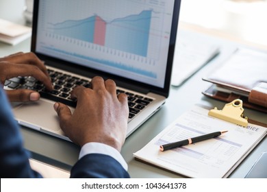 Black Businessman Using Computer Laptop