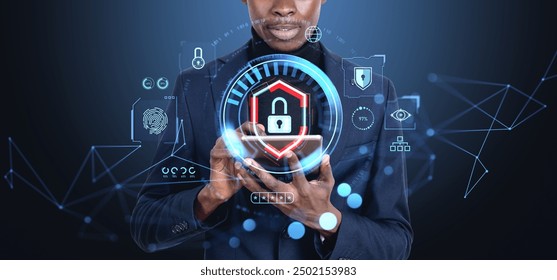 Black businessman working with tablet, shield lock and cybersecurity icons. Personal data protection and binary. Concept of internet, online security and biometric scanning
