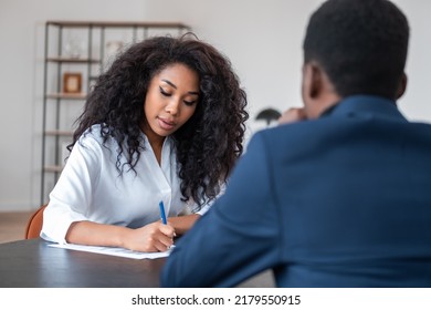 Black Businesswoman Take Note In Paper, Having An Interview With African Businessman. Recruitment In Financial Company, Human Resources. Concept Of Alumni And Career