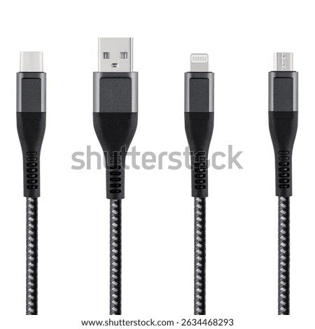 Black cable for charging and synchronization with Type - C, USB, Micro USB, Lightning connectors on a white isolated background close-up