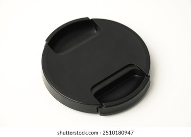 Black camera lens cap cover - Powered by Shutterstock