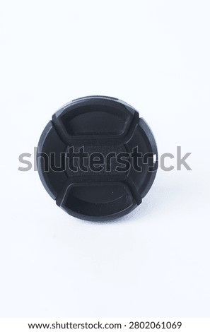 Black Camera Lens Cap Isolated on White Background