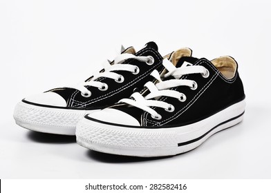 Black Canvas Shoes On A White Background