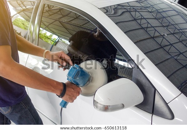 Black car body color polishing by electric drill -\
auto body repair