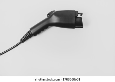 Black Car Charger Isolated . Ev Electric Vehicle For Environment.