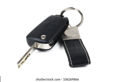 Black Car Key And Keychain On White Background