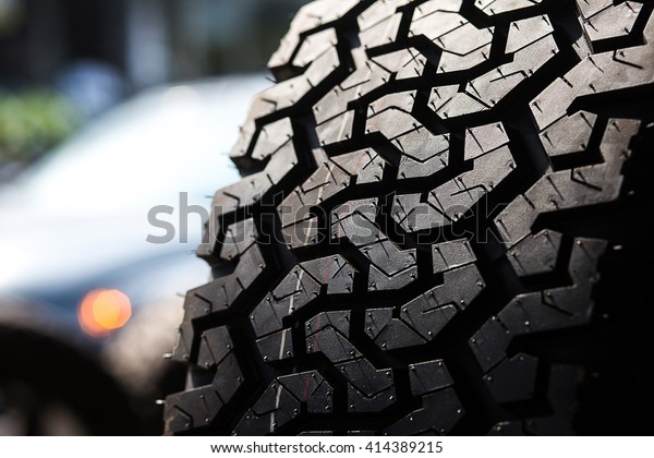 black car wheel -
closeup