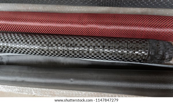 Black carbon\
fiber composite material on the\
roll