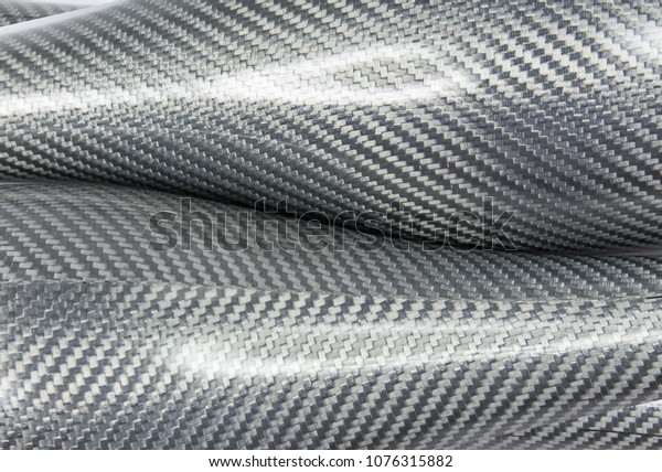 Black
carbon fiber composite raw material
background