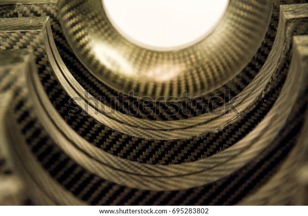 Black carbon fiber composite raw material
close up background