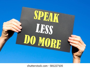 Black card placard with the concept of Speak Less Do More against a clear blue sky background - Shutterstock ID 581227105