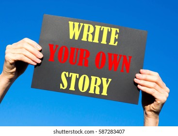 Black card placard with the concept of Write Your Own Story against a clear blue sky background - Shutterstock ID 587283407