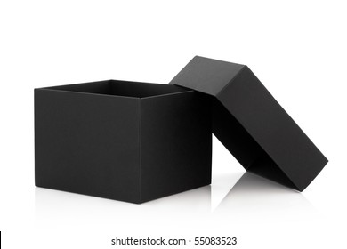 Black Cardboard Box With The Lid Off Over White Background With Reflection.