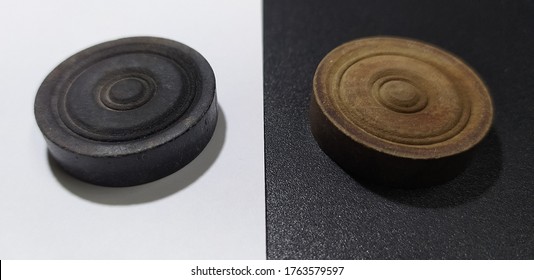 Black Carrom Coin On White Background And White Carrom Coin On Black Background. Symbolic Concept Of Color Or Racial Discrimination People Has To Suffer Because They Are From Different Places.