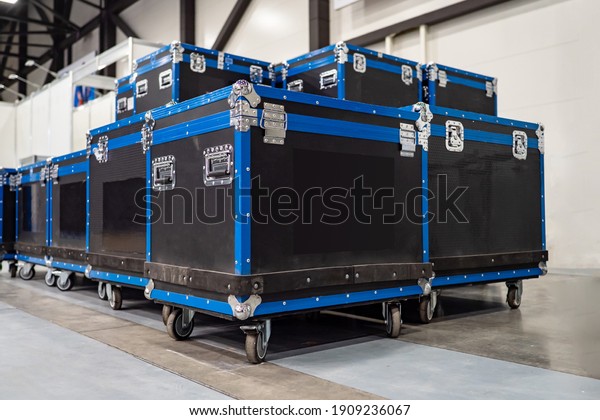 Black cases\
for musical equipment. Carrying cases for sound equipment. Concept\
- audio equipment brands. Rent of musical instruments. installation\
for organizing events in\
cases.