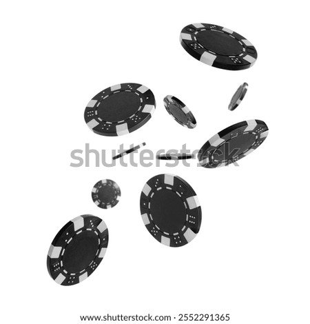 Black casino chips in air on white background