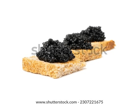Black Caviar on Bread Isolated, Sturgeon, Sevruga, Beluga Caviare, Luxury Seafood, Expensive Gourmet Delicatessen, Black Caviar on White Background