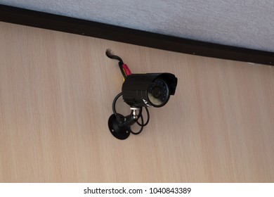 Black CCTV camera security on ceiling
