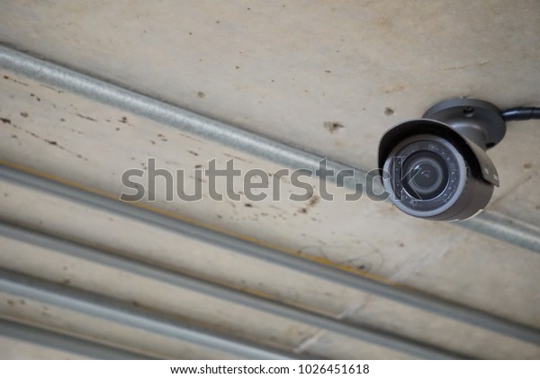 Black Cctv On Concrete Ceiling Background Stock Photo Edit Now