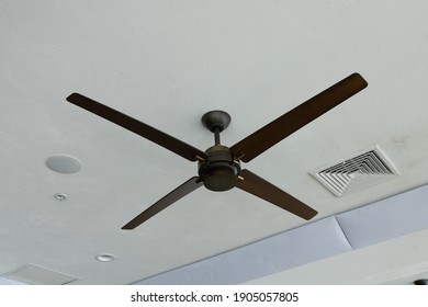 Black Ceiling Fan On White Ceiling