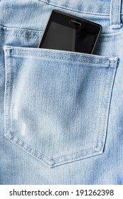 Black Cell Phone In A Jeans Back Pocket