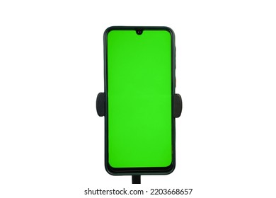 portador de trípode de teléfono celular negro. con pantalla verde, pantalla vertical hp. fondo blanco aislado