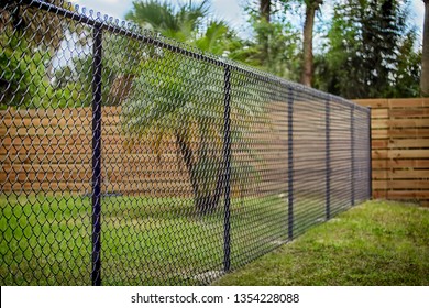 Black Chain Link Fence - Shutterstock ID 1354228088