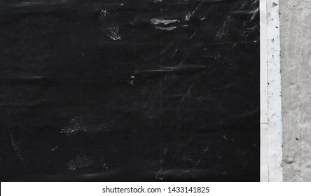 Black Charcoal Scuffed Scratched Street Poster Paper Texture On Urban Weathered Exposed Concrete Wall Background