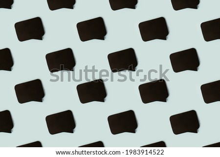 Black chat cloud, speech bubble icons on blue color background. Talking and message for social media concepts ideas, banner for site, mock up, copy space
