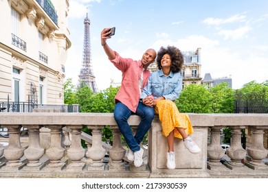 Black Cheerful Happy Couple In Love Visiting Paris City Centre And Eiffel Tower - African American Tourists Travelling In Europe And Dating Outdoors