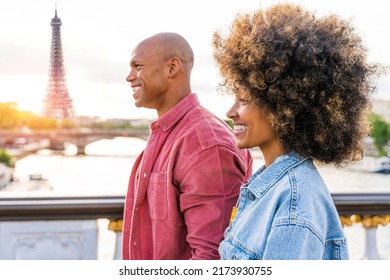 Black Cheerful Happy Couple In Love Visiting Paris City Centre And Eiffel Tower - African American Tourists Travelling In Europe And Dating Outdoors