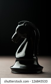 Black Chess Knight On Background