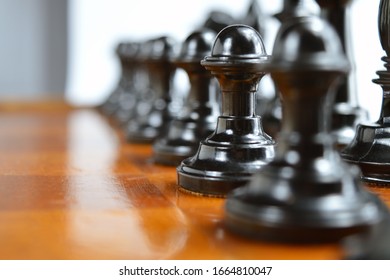 Black chess pieces close up. - Shutterstock ID 1664810047